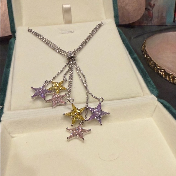 Elegant Silver and Gold Star Necklace - Picture 11 of 11